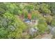 Aerial view showcasing the home nestled within a lush, green landscape at 1047 Holt Rd., Conway, SC 29526