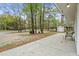 Side view of the home with a concrete patio and view of the yard at 1047 Holt Rd., Conway, SC 29526