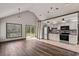 Bright open concept living and kitchen area featuring stainless steel appliances and backyard access at 1047 Holt Rd., Conway, SC 29526