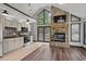 Modern kitchen with stainless appliances, fireplace, and vaulted ceiling at 1047 Holt Rd., Conway, SC 29526