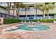 Relaxing hot tub surrounded by lush landscaping, providing a tranquil oasis for residents and guests at 1105 Coral Beach Circle # 438, Myrtle Beach, SC 29577