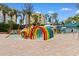 Colorful splash pad with interactive water features, providing a fun and safe play area for children at 1105 Coral Beach Circle # 438, Myrtle Beach, SC 29577