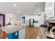Bright, updated kitchen with white cabinets, stainless steel appliances, and a spacious center island at 1210 Harbison Circle, Myrtle Beach, SC 29579
