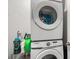 This laundry area has a stacked washer and dryer set at 1210 Harbison Circle, Myrtle Beach, SC 29579