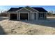 New construction home with a two-car garage, green siding and covered front entryway at 1498 Hardwick Rd., Conway, SC 29526
