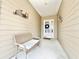 Comfortable covered porch with a bench seat, offering a welcoming entrance to the home at 1652 Murrell Pl., Murrells Inlet, SC 29576