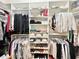 Organized walk-in closet features ample shelving and hanging space for clothes, shoes, and accessories at 1652 Murrell Pl., Murrells Inlet, SC 29576