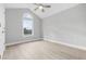 Bright bedroom featuring vaulted ceilings, a bright window, and neutral paint at 1892 Blue Bird Rd., Loris, SC 29569