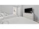 Bedroom featuring two beds with white bedding and a view into the kitchen at 2001 S Ocean Blvd. # 720, Myrtle Beach, SC 29577