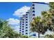Beautiful exterior shot of the resort building, highlighting its architecture and tropical surroundings at 2001 S Ocean Blvd. # 720, Myrtle Beach, SC 29577