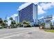 Beautiful exterior view of the Bluewater Resort building on a sunny day with a blue sky at 2001 S Ocean Blvd. # 720, Myrtle Beach, SC 29577
