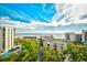 Aerial view showing coastline and adjacent buildings under a beautiful blue, cloudy sky at 210 75Th Ave. N # 4034, Myrtle Beach, SC 29572