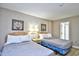 Comfortable bedroom featuring two beds, bedside table, and soft lighting for a relaxing ambiance at 210 75Th Ave. N # 4034, Myrtle Beach, SC 29572