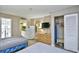 Comfortable bedroom with twin beds, dresser, TV, and access to the kitchenette and bathroom at 210 75Th Ave. N # 4034, Myrtle Beach, SC 29572