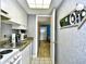 Kitchenette featuring a range, sink, microwave, and coffee maker for convenient meal preparation at 210 75Th Ave. N # 4034, Myrtle Beach, SC 29572