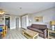 Cozy living room with seating and closet space, flowing to the entry hall and bedroom at 210 75Th Ave. N # 4034, Myrtle Beach, SC 29572