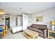 Cozy living room flows to the bedroom with a comfy sofa, and relaxing decor at 210 75Th Ave. N # 4034, Myrtle Beach, SC 29572