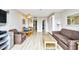 Cozy living room with modern decor, comfortable seating, and a view of the dining area at 210 75Th Ave. N # 4034, Myrtle Beach, SC 29572
