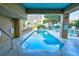 Indoor pool featuring marked depth, steel railing, and lounge chairs at 210 75Th Ave. N # 4034, Myrtle Beach, SC 29572