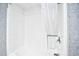 Shower featuring a white tub, shower curtain, and sleek chrome shower head at 210 75Th Ave. N # 4034, Myrtle Beach, SC 29572