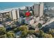 Aerial view of a condominium complex near the ocean featuring a tile roof at 213 76Th Ave. N, Myrtle Beach, SC 29577