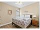 The bedroom features a queen size bed and light-colored walls at 213 76Th Ave. N, Myrtle Beach, SC 29577