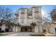 Multi-story condo building featuring private balconies and covered parking at 213 76Th Ave. N, Myrtle Beach, SC 29577
