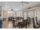 Open-concept living and dining area with large windows offering natural light at 213 76Th Ave. N, Myrtle Beach, SC 29577
