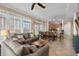 Spacious living and dining areas with tiled floors and ceiling fans at 213 76Th Ave. N, Myrtle Beach, SC 29577