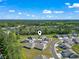 Aerial view of the community, showing the layout of homes, streets, and beautiful natural surroundings at 216 Kinross Ct., Little River, SC 29566