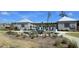 Community pool area entrance with picnic tables, benches, and BBQ grills at 216 Kinross Ct., Little River, SC 29566