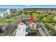 Aerial image featuring a building with a rooftop pool, street views, and vibrant cityscape in the background at 2710 S Ocean Blvd. # 407-A, Myrtle Beach, SC 29577