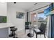Bright dining area with balcony access, providing views and natural light at 2710 S Ocean Blvd. # 407-A, Myrtle Beach, SC 29577