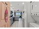 Modern kitchen featuring stainless appliances, an island, and a view of the balcony and waterfront at 2710 S Ocean Blvd. # 407-A, Myrtle Beach, SC 29577