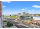 A view of the ocean, street, and outdoor pool area from the condominium at 2710 S Ocean Blvd. # 407-A, Myrtle Beach, SC 29577