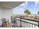 Balcony view overlooks a pool, and the beach with palm trees at 3000 N Ocean Blvd. # 130, Myrtle Beach, SC 29577