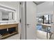Bathroom leading to a living area with a balcony and ocean view at 3000 N Ocean Blvd. # 130, Myrtle Beach, SC 29577