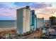 Oceanfront resort with a large pool, beach access, and multiple floors of condo units at 3000 N Ocean Blvd. # 130, Myrtle Beach, SC 29577