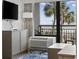 Cozy living room featuring ocean views from a private balcony at 3000 N Ocean Blvd. # 130, Myrtle Beach, SC 29577