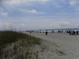 Enjoy the sandy beach with plenty of space for beach umbrellas at 305 N Hillside Dr. N # 103, North Myrtle Beach, SC 29582