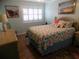 Charming bedroom features a full bed and beachy decor, creating a welcoming atmosphere at 305 N Hillside Dr. N # 103, North Myrtle Beach, SC 29582
