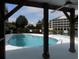Community pool with a view of the water tower and buildings at 305 N Hillside Dr. N # 103, North Myrtle Beach, SC 29582