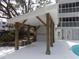 Covered grilling area with grill, ceiling fan, and fire extinguisher at 305 N Hillside Dr. N # 103, North Myrtle Beach, SC 29582