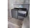 Laundry room with cabinets and newer washer and dryer at 305 N Hillside Dr. N # 103, North Myrtle Beach, SC 29582