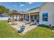 Lovely patio with a pergola, outdoor seating, and a serene view of the beautifully landscaped backyard at 318 Board Landing Circle, Conway, SC 29526