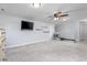Spacious bonus room features a ceiling fan and ample carpet space at 318 Board Landing Circle, Conway, SC 29526