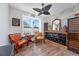 Comfortable office area includes wood flooring, natural light, and a built-in wine rack and mirror feature at 318 Board Landing Circle, Conway, SC 29526