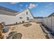 Functional side yard with gravel, raised garden beds and ample space for gardening at 318 Board Landing Circle, Conway, SC 29526