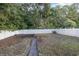 The large backyard is surrounded by a white fence at 3704 Chapel Ln., Myrtle Beach, SC 29588