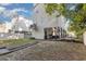 Home's exterior with a spacious grassy backyard at 3704 Chapel Ln., Myrtle Beach, SC 29588
